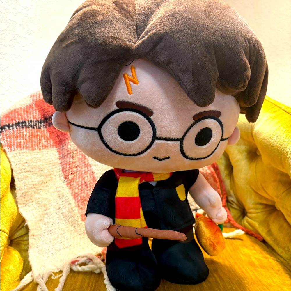 Standing Harry Potter Stuffed toy. small rip